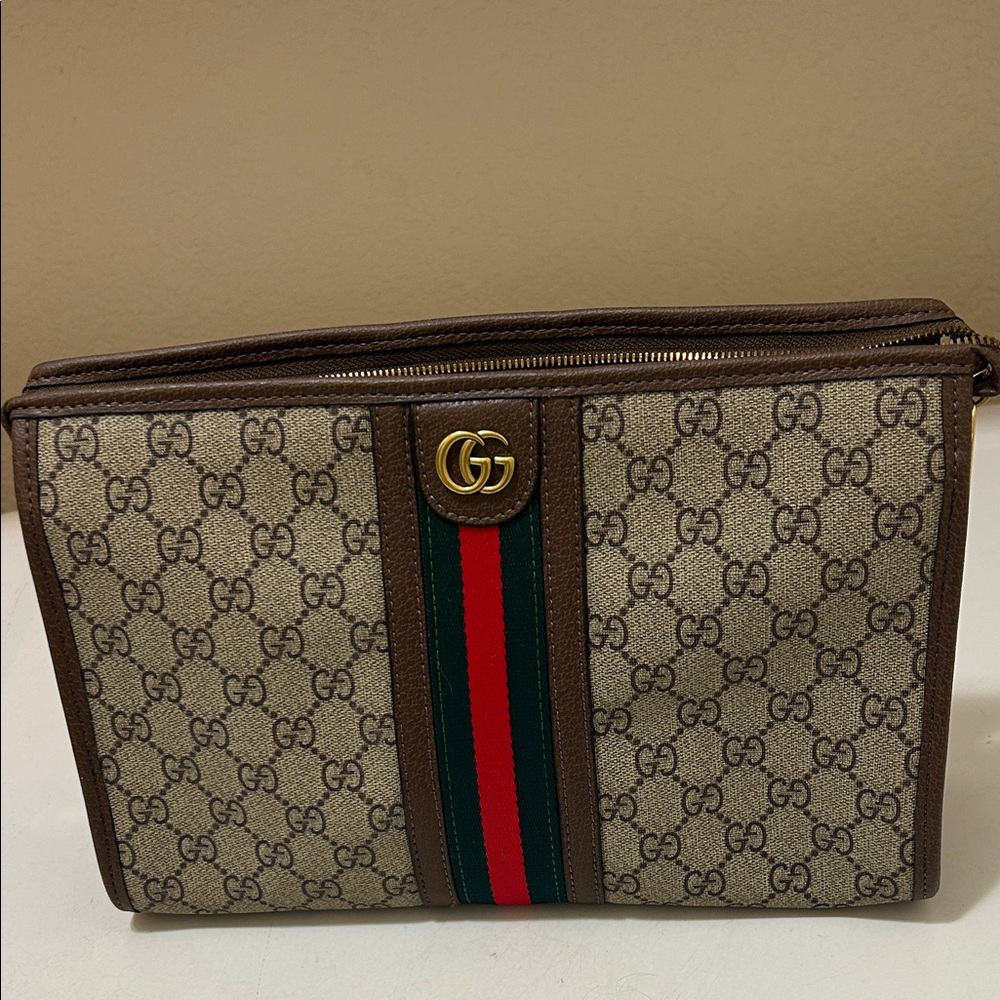 Gucci logo Clutch Bag. 11 x 8 inch. Excellent
